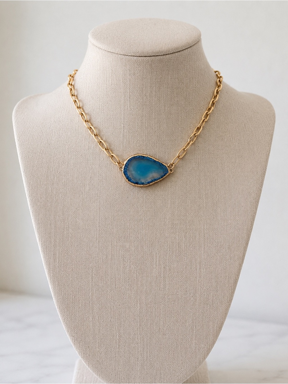 Gold-Trim Blue Pendant Necklace